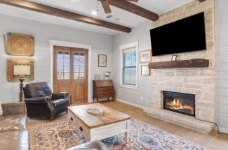 Guest house living area with fireplace