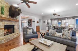 Living area view to dining room & kitchen