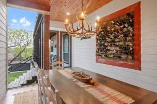 Dining room overlooking backyard to Live Oak Creek