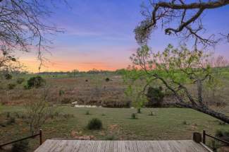 Sunset view of creek from sitting area