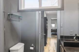 Half bath located in master walk-in closet