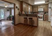 Kitchen looking into sunroom