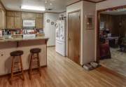 Kitchen looking into living room