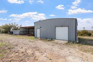 Storage building with roll up doors