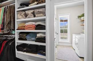 Walk-in closet attached to master bath and utility room