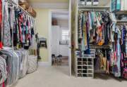 Master closet looking into laundry room