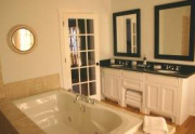 blue-bath-Boutique hotel Inn sale Fredericksburg TX 300x199