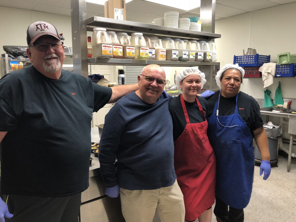 Volunteers cooking